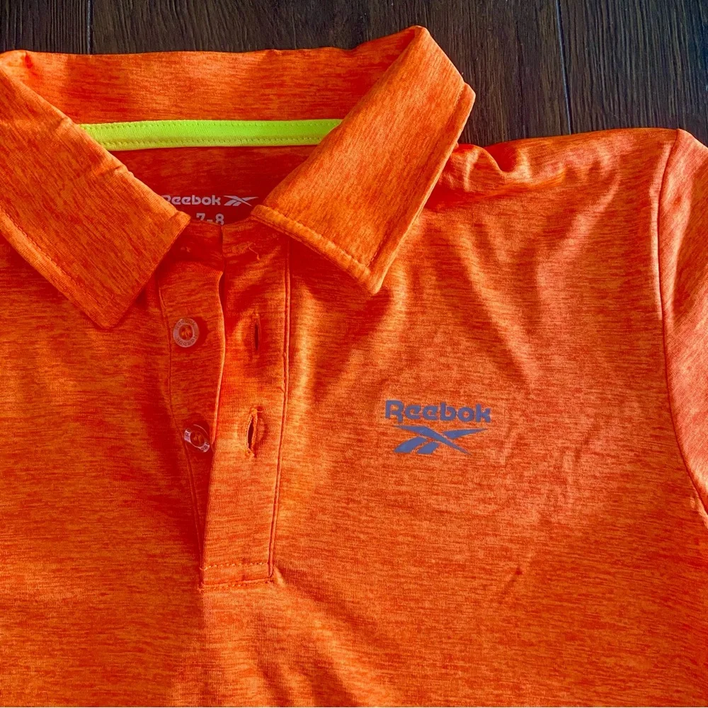 NWT Reebok performance orange heather short sleeve polo shirt size 7/8 - Picture 2 of 4